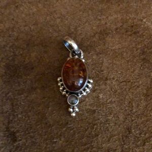 Sterling Silver pendant with amber glass